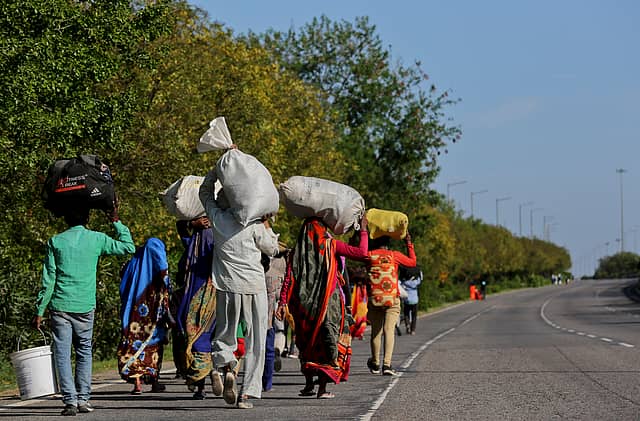 Ashish Sharma Captures Daily Wage Migrant Workers' Exodus from Delhi