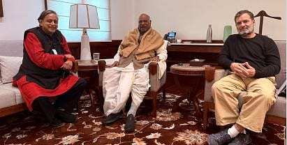 Why is Shashi Tharoor smiling?