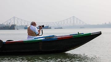 Watch | PM Modi Takes Boat Ride on Hooghly River, Admires Howrah Bridge from the Waters