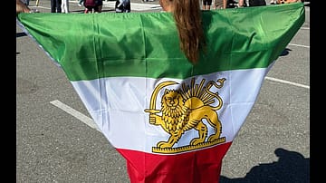Iran Anthem Booed, Pre-Revolutionary Flags Wave Despite FIFA Ban at World Cup