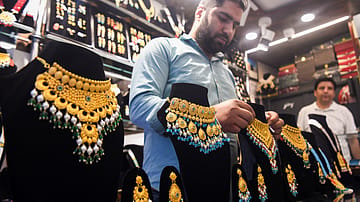 Gold Prices Likely to Stay Under Pressure Amid Strong US Dollar and Fed Policy Outlook: Analysts