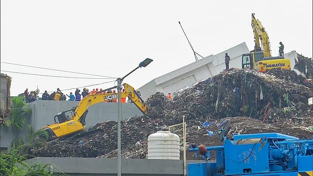 Search and rescue operations underway at the site after a waste mound fell onto a building, leading to a collapse, in the Moshi area of Pimpri-Chinchwad, in Pune. Search and rescue operations underway at the site after a waste mound fell onto a building, leading to a collapse, in the Moshi area of Pimpri-Chinchwad, in Pune.