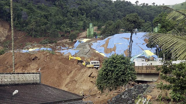 A search and rescue operation underway at the site where seven people died and several went missing in the incident, in Wayanad on Friday. A search and rescue operation underway at the site where seven people died and several went missing in the incident, in Wayanad on Friday.