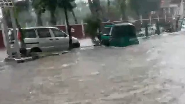 Due to heavy rainfall, many low-lying areas in Dhaka have been inundated. Due to heavy rainfall, many low-lying areas in Dhaka have been inundated.