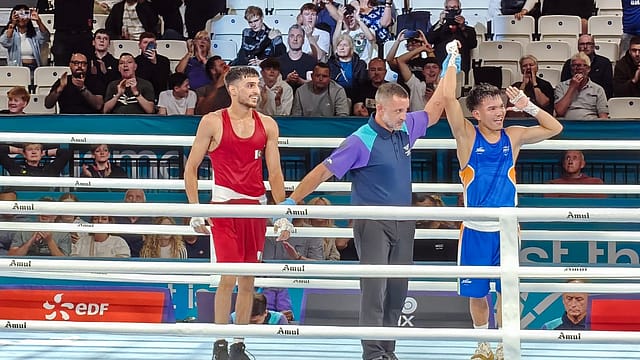 Jadumani Singh punched his way into the men's 55kg boxing final Jadumani Singh punched his way into the men's 55kg boxing final