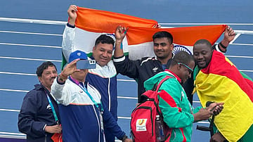 Soman Rana (L) with Shubham Juyal: Rana won historic men's F57 shot put gold as Juyal settled for silver 