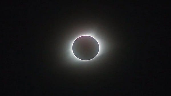 A total solar eclipse occurs when the Moon passes directly between Earth and the Sun, completely covering the Sun's disc for observers along a narrow path on Earth A total solar eclipse occurs when the Moon passes directly between Earth and the Sun, completely covering the Sun's disc for observers along a narrow path on Earth