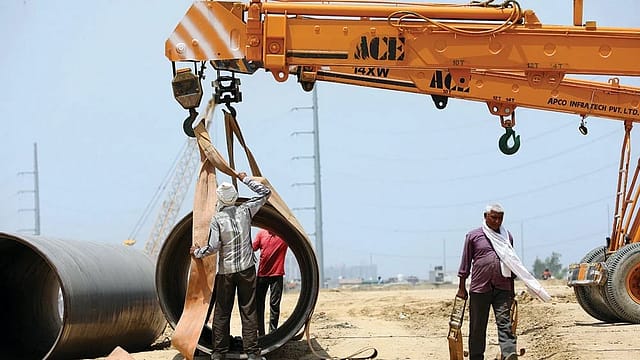 Continuous monsoon rain allowed water to seep beneath the pavement, weakening the soil and causing sections of the newly inaugurated expressway to slip. To speed up repairs, engineers deployed high-powered electric fans Continuous monsoon rain allowed water to seep beneath the pavement, weakening the soil and causing sections of the newly inaugurated expressway to slip. To speed up repairs, engineers deployed high-powered electric fans