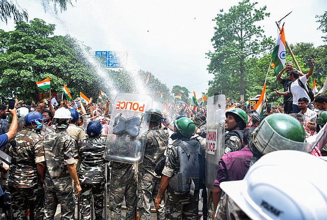 Police fire water cannons at students marching towards the Jharkhand Assembly in Ranchi on August 10, protesting alleged JPSC and JSSC-CGL exam paper leaks Police fire water cannons at students marching towards the Jharkhand Assembly in Ranchi on August 10, protesting alleged JPSC and JSSC-CGL exam paper leaks