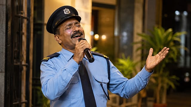 A security guard by uniform, a music teacher at heart A security guard by uniform, a music teacher at heart