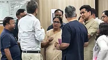 Delhi Chief Minister Rekha Gupta, accompanied by Cabinet Minister Kapil Mishra, meets doctors at AIIMS Trauma Centre on Sunday after the Satya Niketan collapse. Her promise to punish those responsible faces a larger test: making the next building safe before it falls