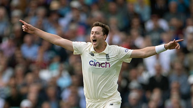 England pacer Ollie Robinson celebrates another Pakistan wicket during the third Test at Edgbaston. His 3/15 took him past 100 Test wickets as Pakistan collapsed for 133 England pacer Ollie Robinson celebrates another Pakistan wicket during the third Test at Edgbaston. His 3/15 took him past 100 Test wickets as Pakistan collapsed for 133