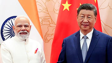 Prime Minister Narendra Modi with Chinese President Xi Jinping, whose September 12–13 BRICS visit will be his first trip to India since 2019. The visit puts the spotlight on efforts to stabilise India-China ties, with a separate bilateral meeting yet to be announced