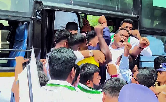 Protesters get detained during their demonstration against the alleged irregularities in the Karnataka Public Service Commission (KPSC) examination, in Bengaluru. Protesters get detained during their demonstration against the alleged irregularities in the Karnataka Public Service Commission (KPSC) examination, in Bengaluru.