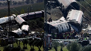Rescue personnel work at the site of the collision of two high-speed trains near Toledo, Spain