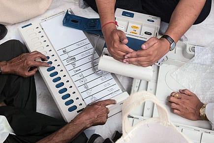 EVM for Us, Paper for Them EVM for Us, Paper for Them