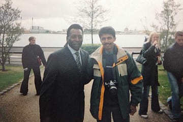 Pele put his arm around me and asked his assistant to take a photo