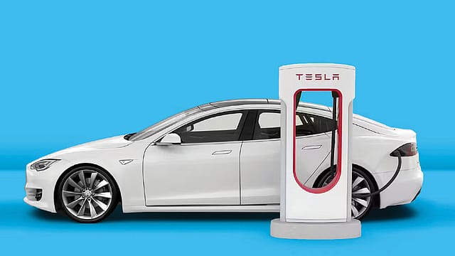 Tesla Supercharger Plugs In